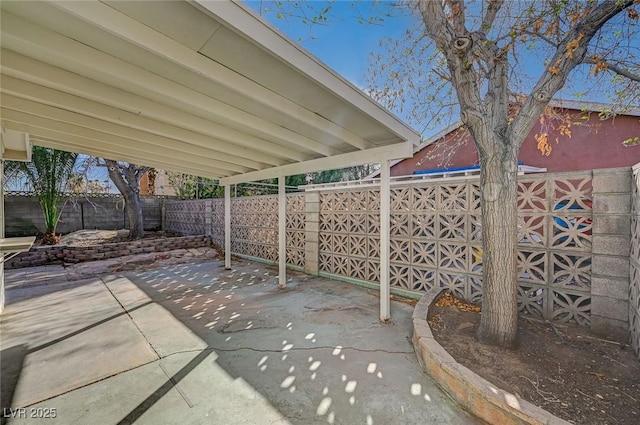 view of patio with a fenced backyard