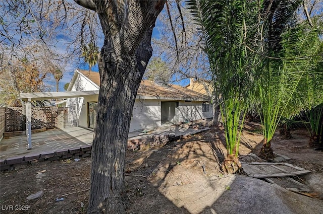 view of home's exterior featuring a patio and stucco siding