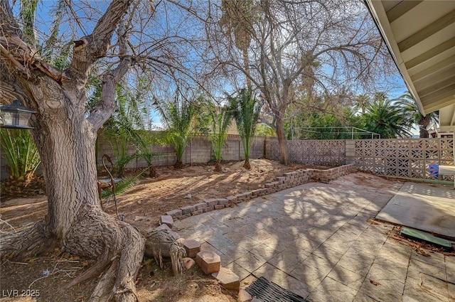 view of patio with a fenced backyard