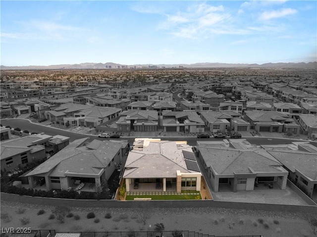 bird's eye view featuring a mountain view and a residential view