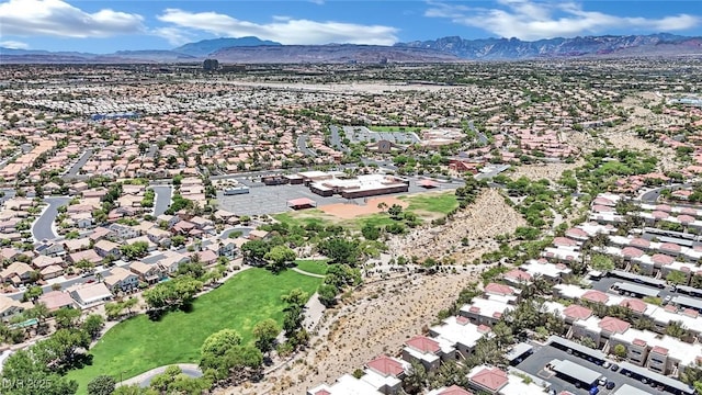 aerial view with a mountain view and a residential view