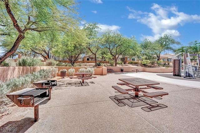 view of property's community featuring a patio