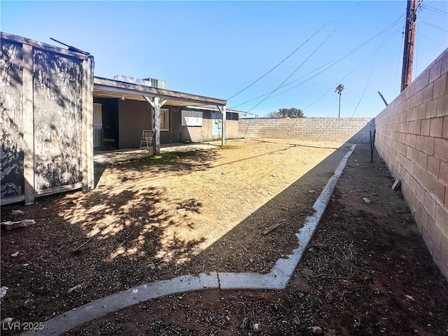 view of yard featuring a fenced backyard