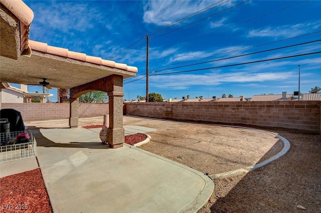 view of yard featuring a patio area and a fenced backyard