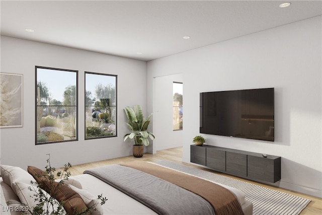 bedroom featuring recessed lighting and wood finished floors