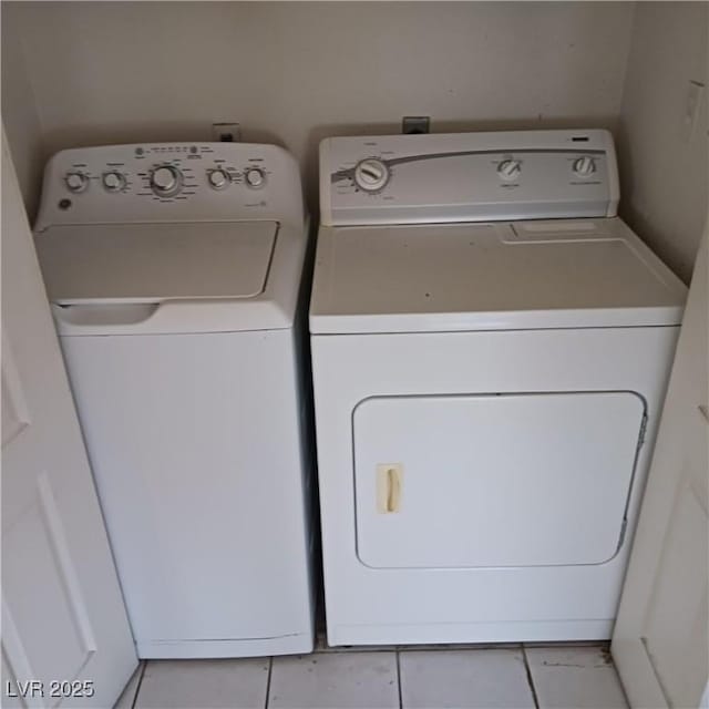 laundry area featuring laundry area and washer and clothes dryer