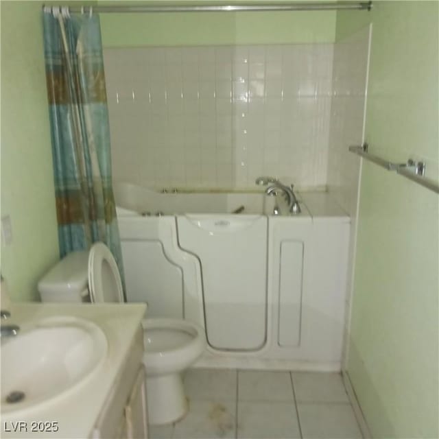 bathroom with vanity, a shower with shower curtain, a tub, tile patterned flooring, and toilet