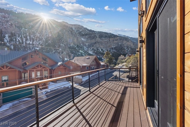 balcony with a mountain view and a residential view