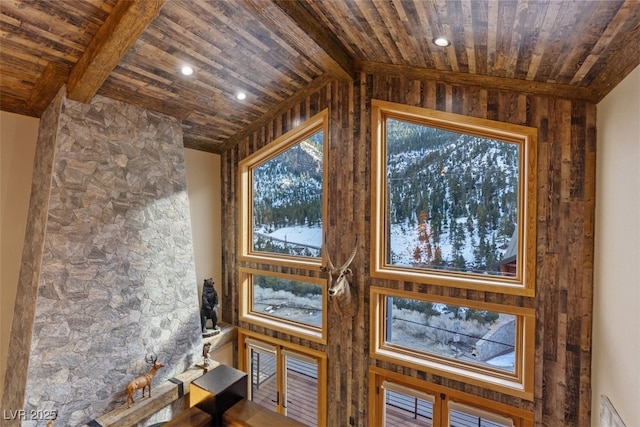 interior space with beam ceiling, recessed lighting, and wood ceiling