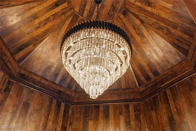 interior details featuring a chandelier