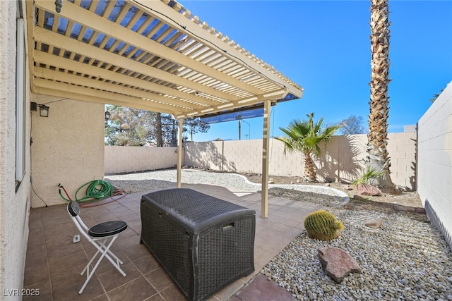 view of patio with a pergola and a fenced backyard