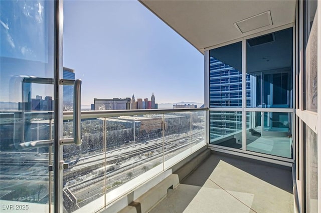 balcony featuring a view of city