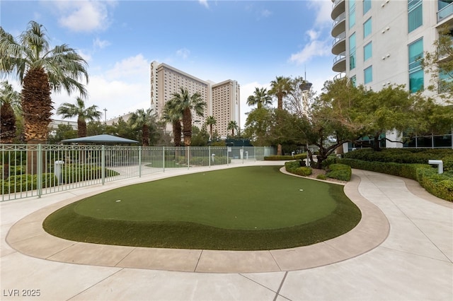 surrounding community featuring fence