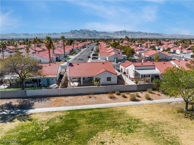 aerial view featuring a mountain view and a residential view