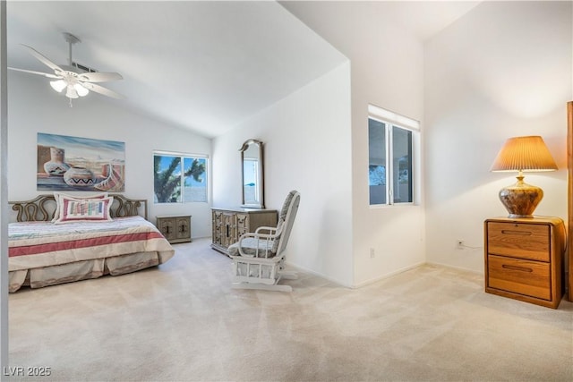 bedroom featuring lofted ceiling and carpet flooring