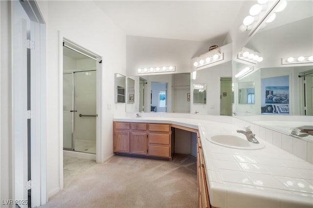 full bath featuring a stall shower and vanity