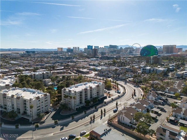 birds eye view of property with a view of city