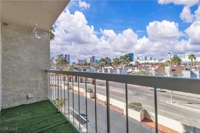 balcony featuring a city view