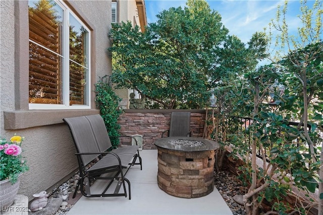 view of patio featuring fence