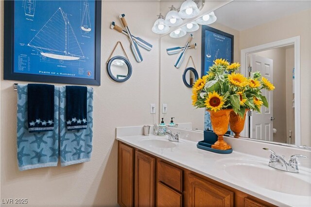 full bathroom featuring a sink and double vanity