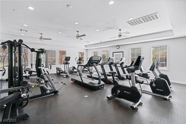 workout area featuring recessed lighting, baseboards, and visible vents