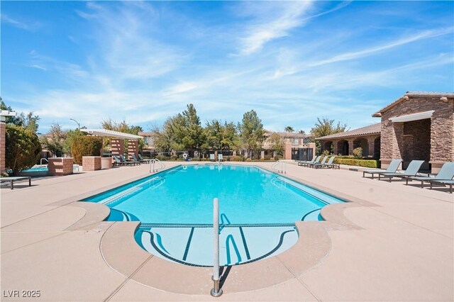 community pool featuring a patio