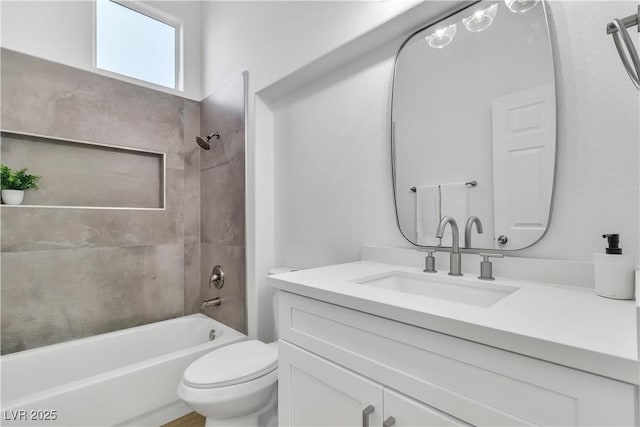 full bath with shower / bathtub combination, toilet, and vanity