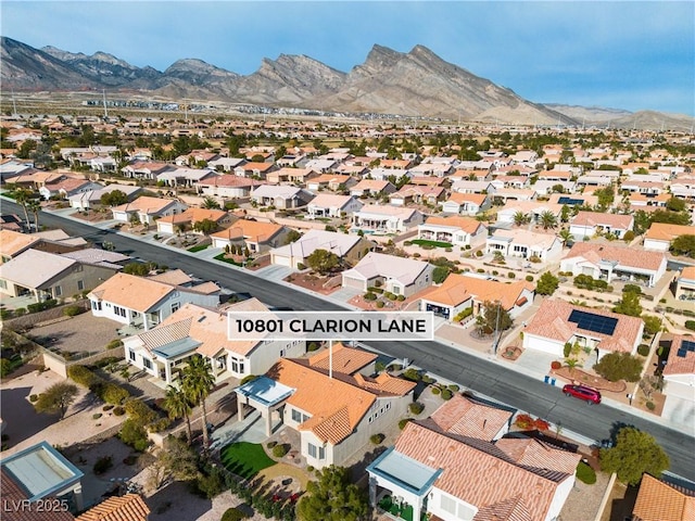 aerial view featuring a residential view and a mountain view