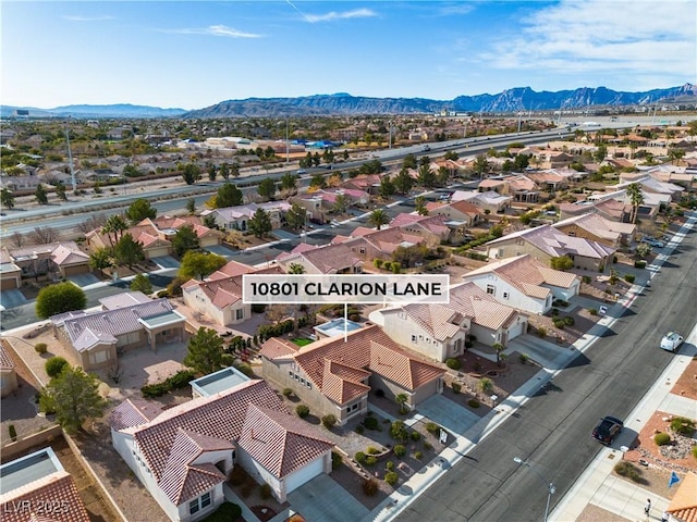 bird's eye view with a mountain view and a residential view