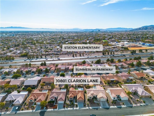 aerial view with a residential view and a mountain view