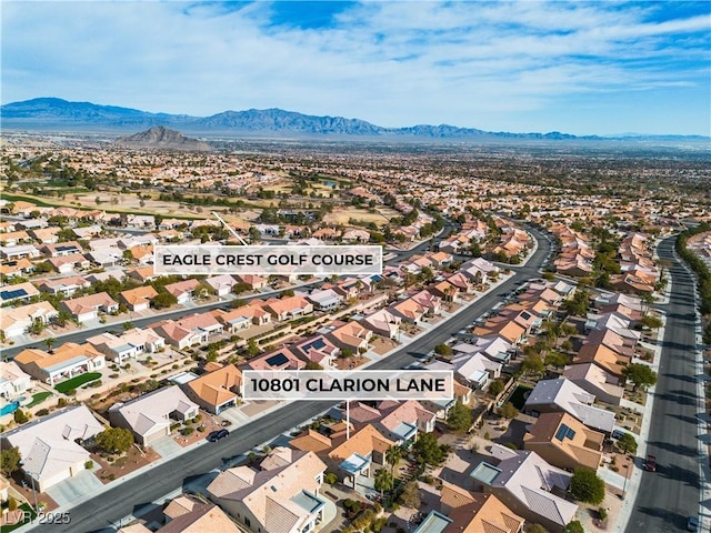 birds eye view of property featuring a residential view and a mountain view