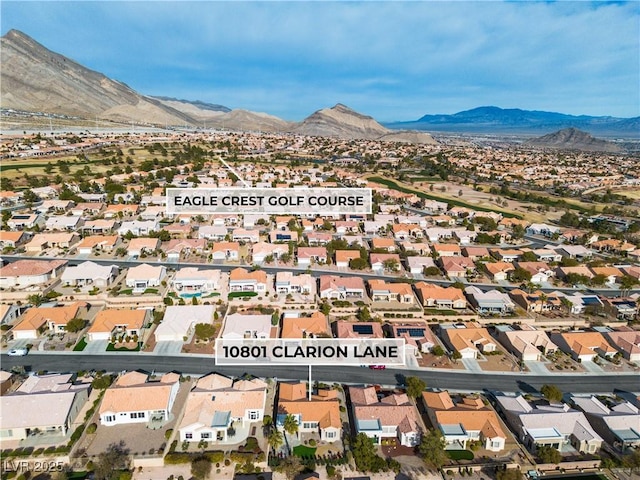 aerial view with a mountain view and a residential view