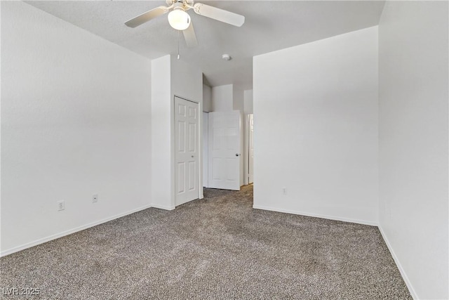 unfurnished bedroom with baseboards, carpet floors, and ceiling fan