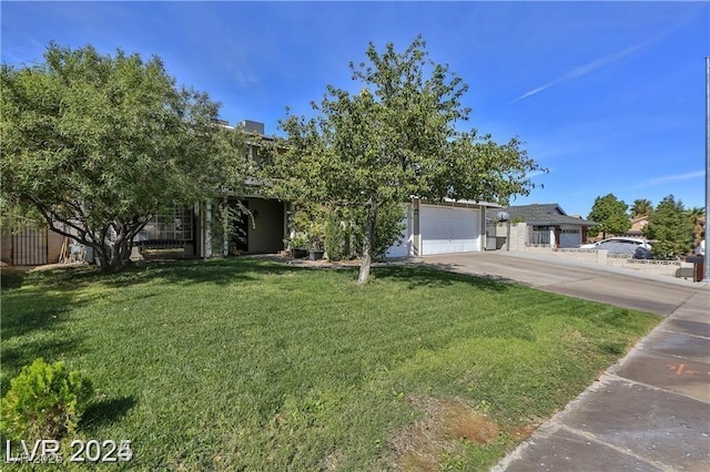 obstructed view of property featuring a garage, a front lawn, driveway, and fence