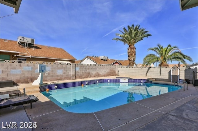 view of pool featuring a fenced in pool, a patio, and a fenced backyard