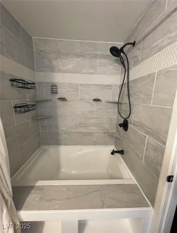 full bathroom featuring a combined bath / shower with jetted tub