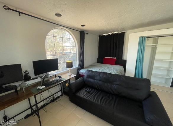 bedroom with a textured ceiling