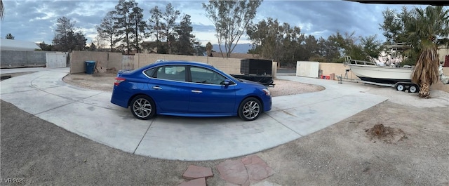 exterior space featuring concrete driveway