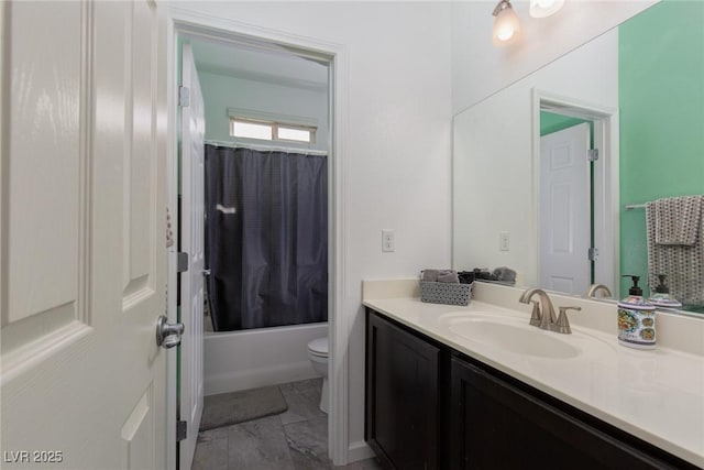 full bath featuring toilet, vanity, and shower / bath combo