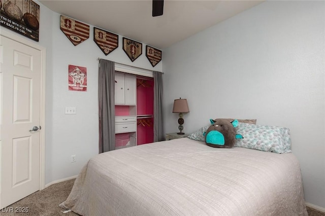 bedroom with a closet, carpet floors, baseboards, and ceiling fan