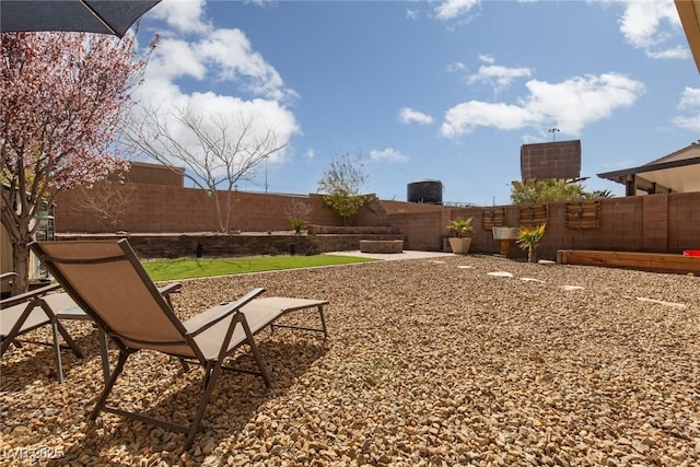 view of yard featuring a fenced backyard