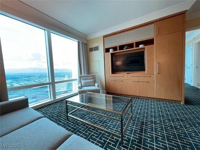 carpeted living room featuring visible vents