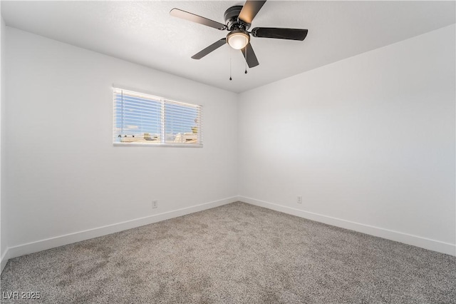 empty room with ceiling fan, baseboards, and carpet floors