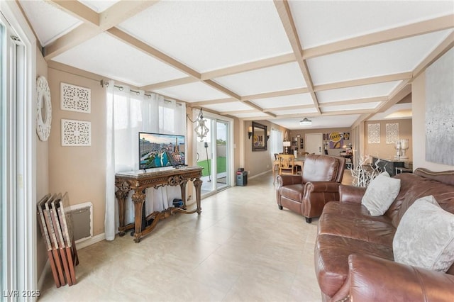 living room with baseboards, beam ceiling, and coffered ceiling