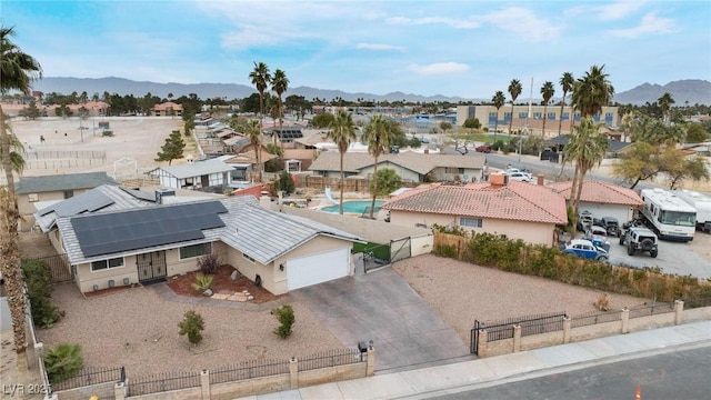 aerial view featuring a mountain view and a residential view