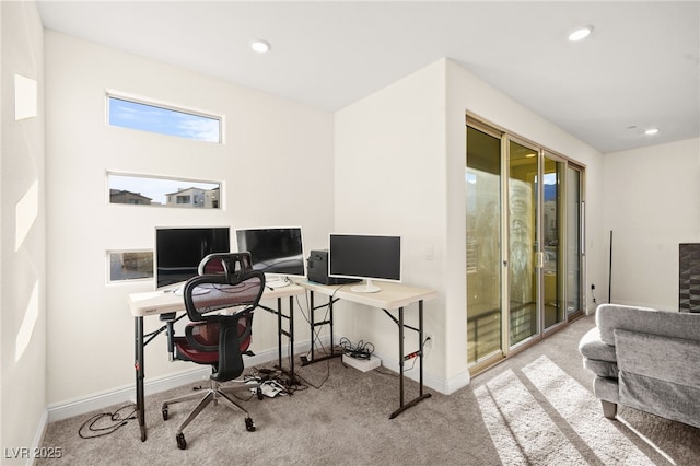 carpeted office with recessed lighting and baseboards