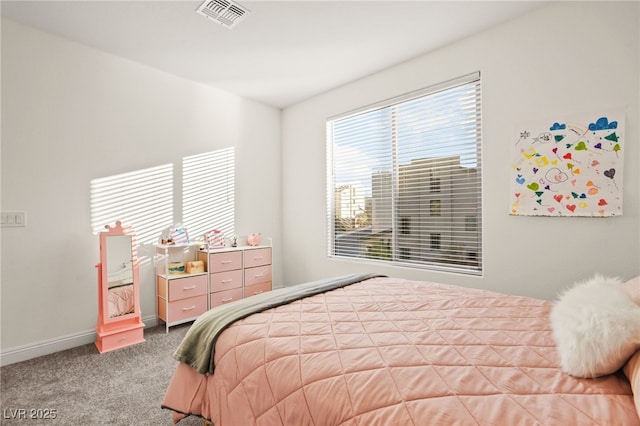 bedroom featuring baseboards, visible vents, and carpet floors