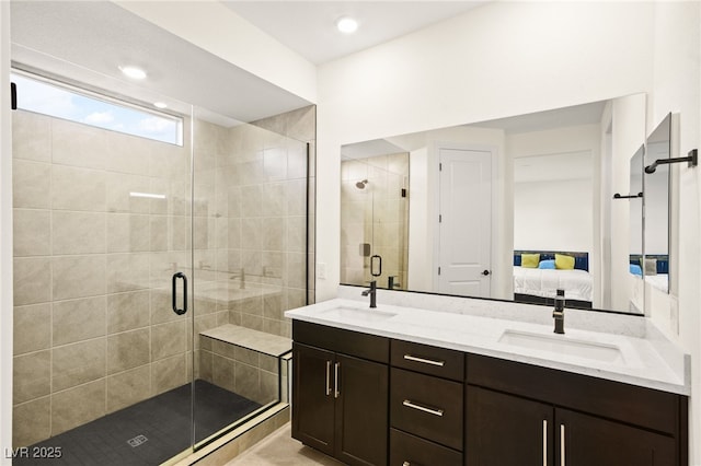 ensuite bathroom with a sink, a stall shower, and ensuite bath