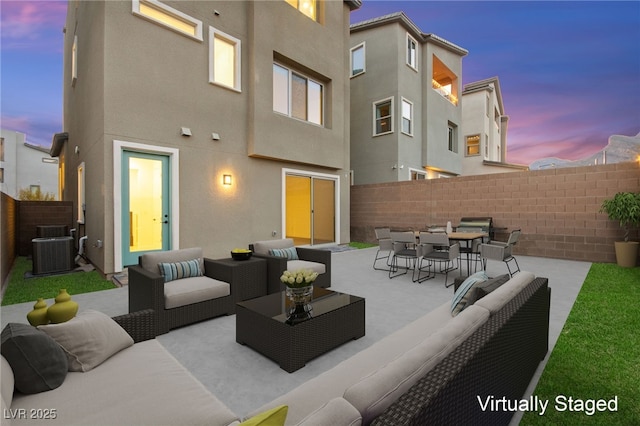 view of patio / terrace with central air condition unit, outdoor lounge area, outdoor dining area, and a fenced backyard