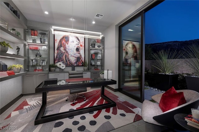 office featuring recessed lighting and visible vents